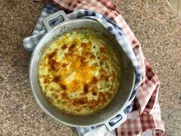 Chayote gratin baked in a dutch oven. This delicious low carb gratin will blow you away. It's one of my favorite chayote recipes. If you've never worked with chayote squash, there's also a great chayote stir-fry recipe included. Also known as Christophene, this amazing fruit is the perfect keto gratin swap for potatoes! #ketorecipes #chayoterecipes #ketodiet #keto #lowcarb