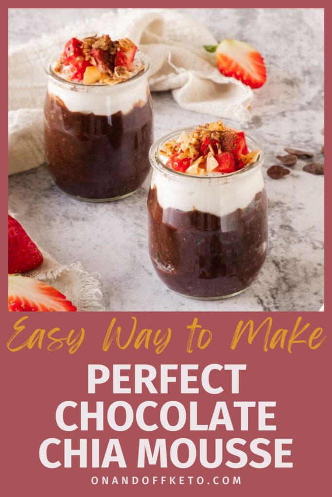 Two jars of luscious chocolate chia mousse crowned with yogurt, strawberries, and granola sit elegantly on a marble surface. Discover the easy way to perfect this delightful treat at onandoffketo.com.