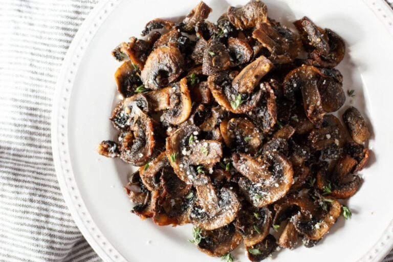 Air fried mushrooms on a plate.