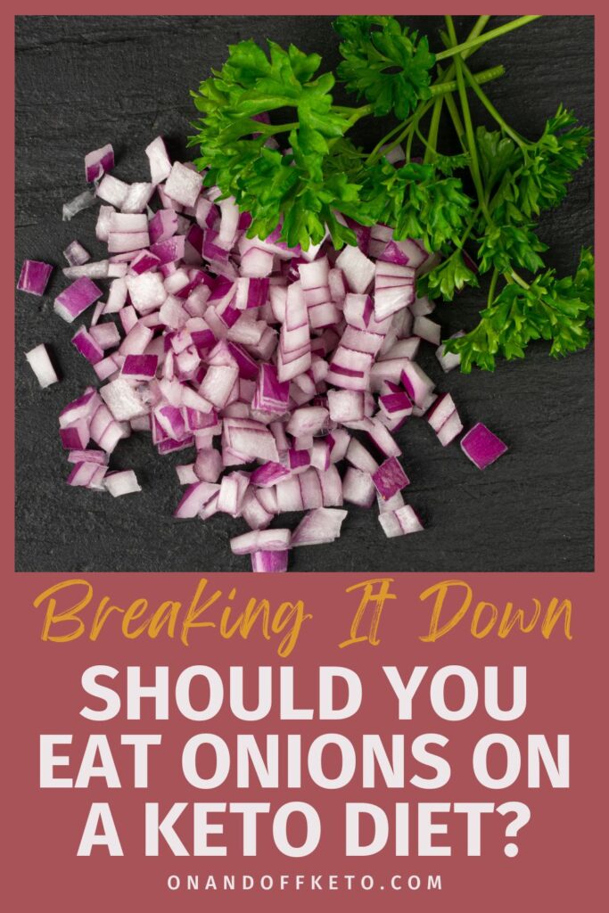 Chopped red onions and parsley on a black surface with text: "Breaking It Down: Are Onions on Keto Diets a Smart Choice?.