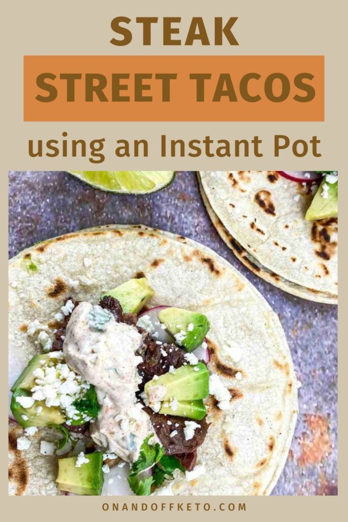 Image of steak street tacos topped with avocado, cheese, and sauce on tortillas, highlighting the mouthwatering flavors enhanced by using an Instant Pot.
