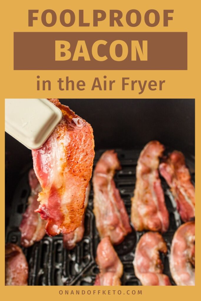 Crispy air fryer bacon strips sizzle to perfection, with one strip held delicately by tongs.