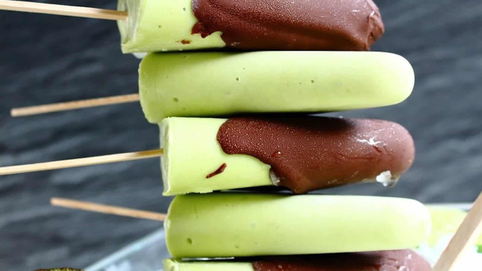 Avocado Popsicles layered on top of each other.